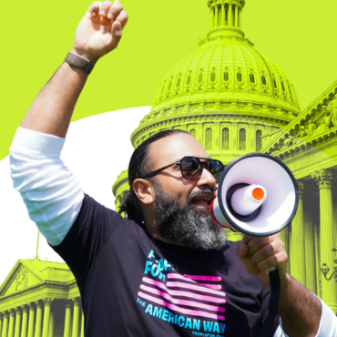 Man with a megaphone in front of a stylized picture of the U.S. Capitol